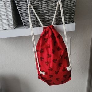 Red Drawstring Backpack with Black Pattern